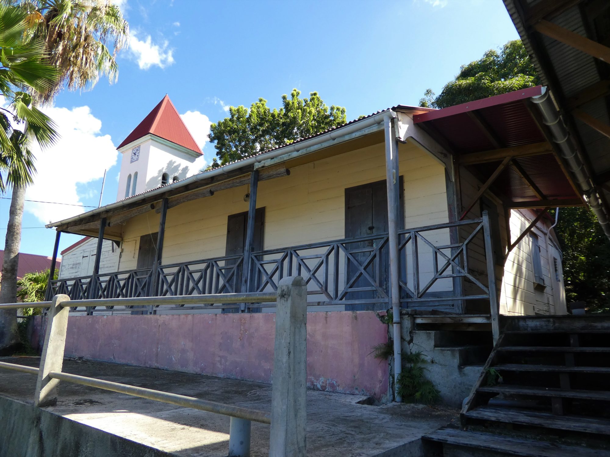 View of the Presbytery at Deshaies (Guadeloupe, ca. 1850s), which serves as the police station in the TV series 'Death in Paradise.'